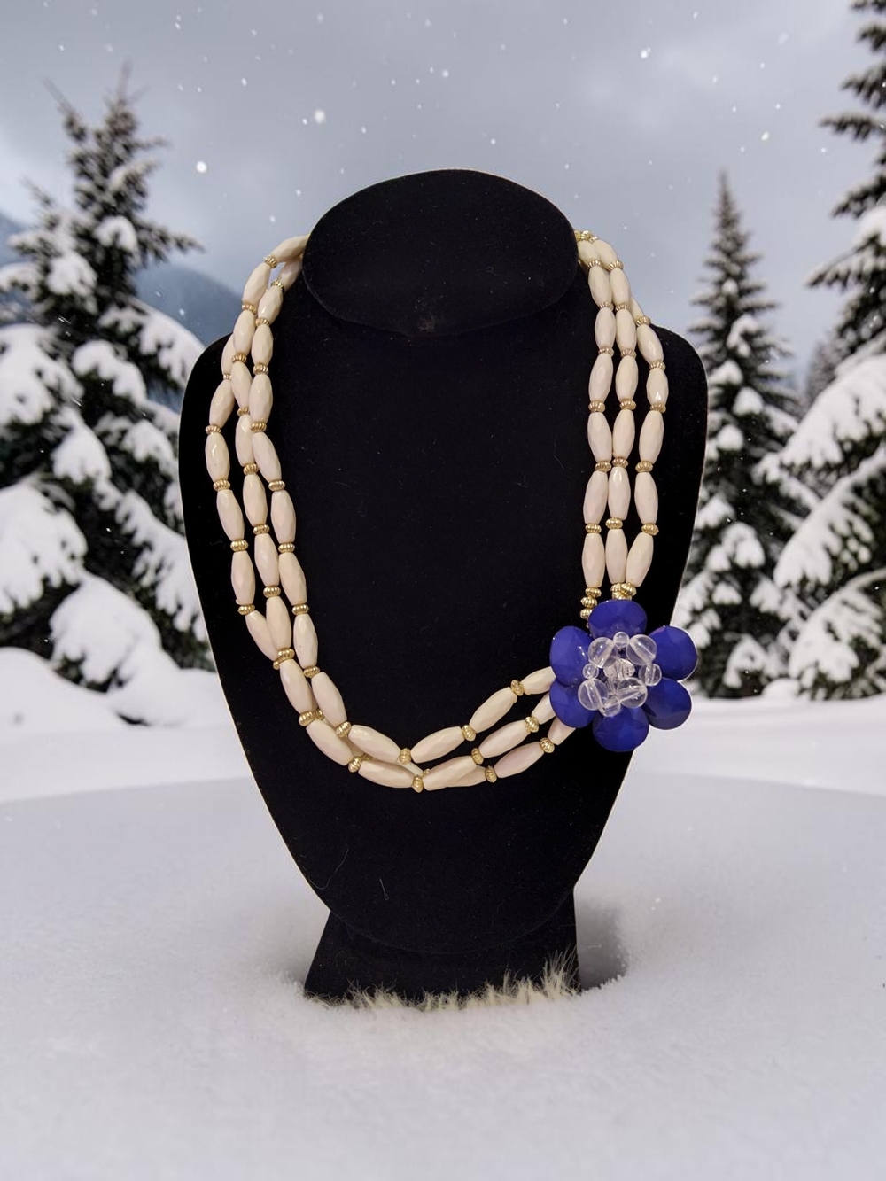 10 /$10  Triple-Strand Necklace with Blue Flower Accent